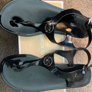 Michael Kors Jelly Sandals 
Size 7.5 Like New
Originally $55 Asking $35
